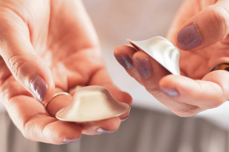 Mum nursing baby using silverette cups